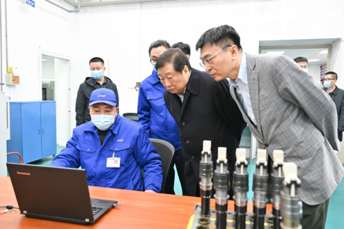 Tan Xuguang Goes to Chongqing Ownership Enterprises For Research